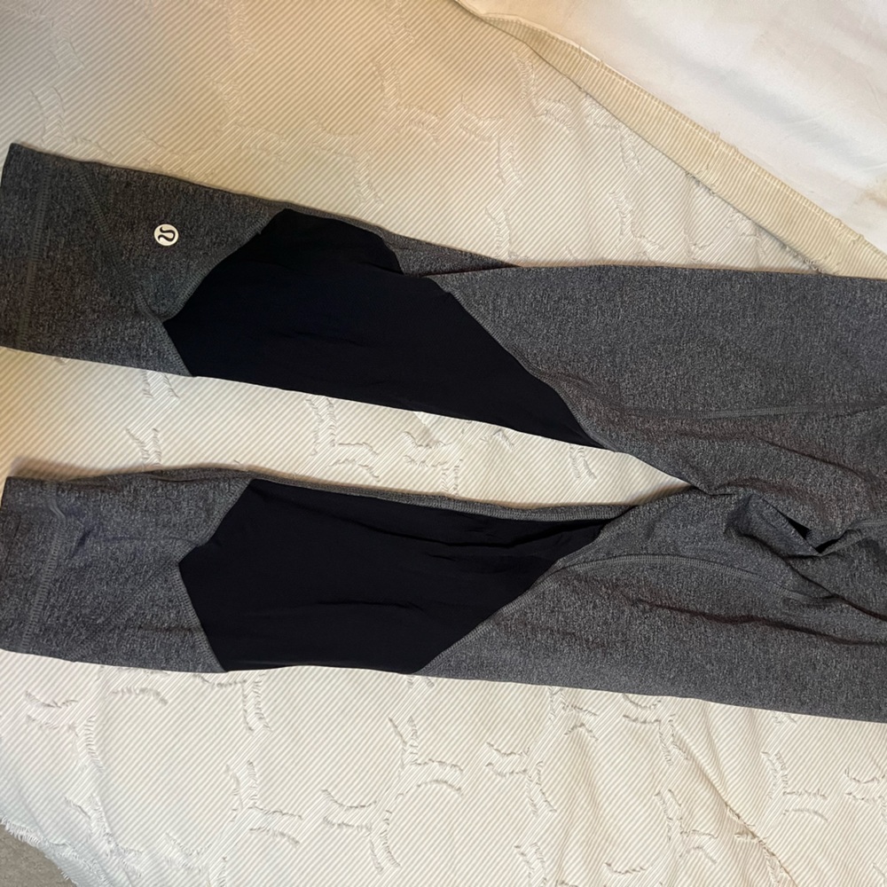 Grey Lulu Lemon size 4 with pockets. Not worn much.